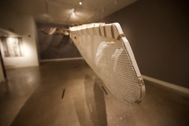 Suspended Text Installation in Museum Gallery Corridor