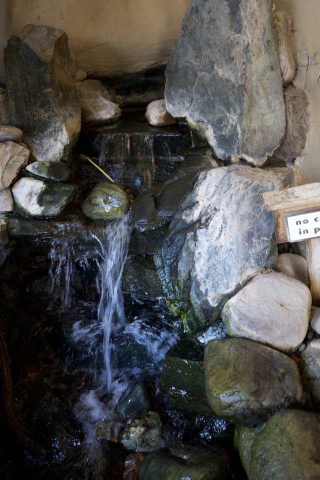 Serene Stone Water Fountain with Natural Rock Formation