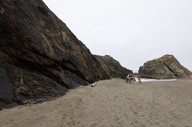 Secluded Cove Between Ancient Sea Cliffs at Dusk