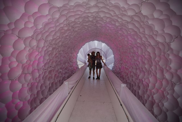 Walking Through a Pink Balloon Tunnel