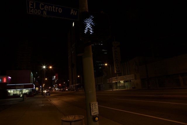 Illuminated Street Sign at Night