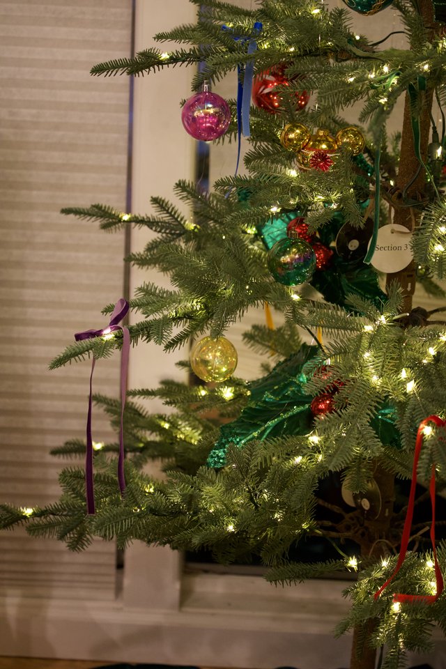 Colorful Ornaments on Illuminated Christmas Tree