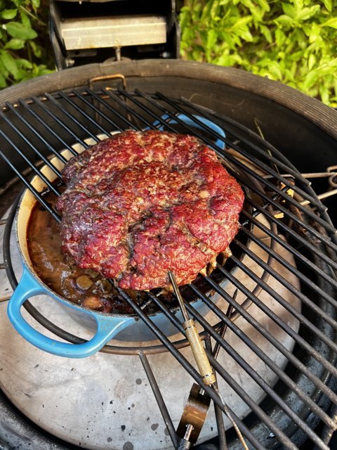 Juicy Meat Patty Sizzling on the Grill