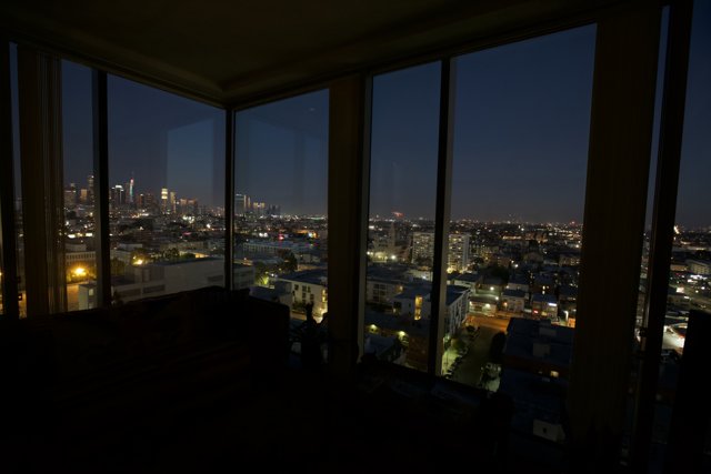 Stunning Cityscape View from a Penthouse Room