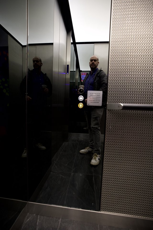 Self-Portrait in Modern Elevator Mirror - Urban Architecture