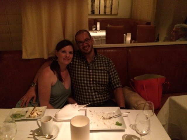 Couple Enjoying a Romantic Dinner at Restaurant