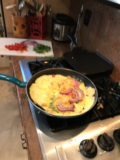 Breakfast Omelet Cooking on Stove