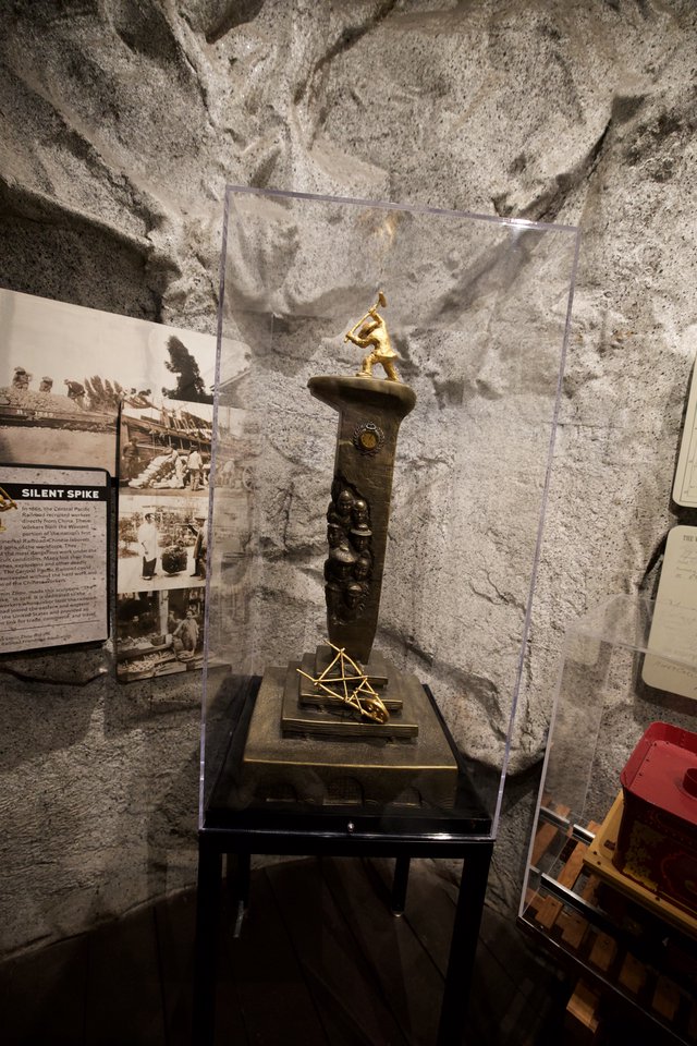Golden Spike Monument Display in Museum Cave Setting