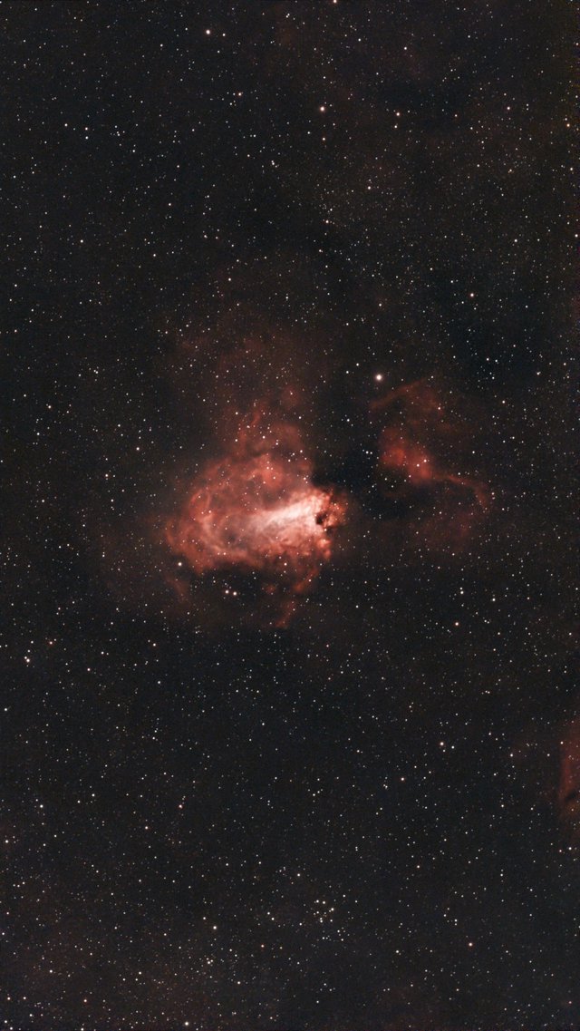 M17 Omega Nebula Glowing in Deep Space