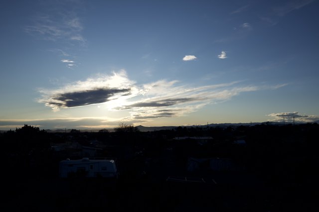 Dramatic Sunset Clouds Over Desert Southwest Landscape