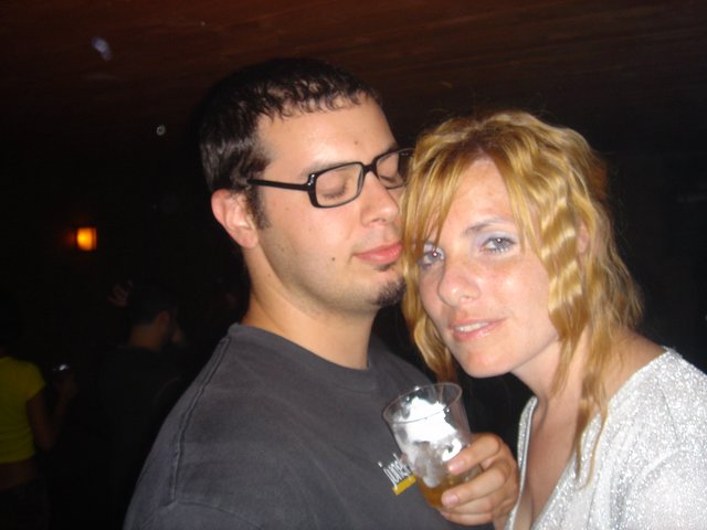Couple Sharing a Moment at a Late Night Bar