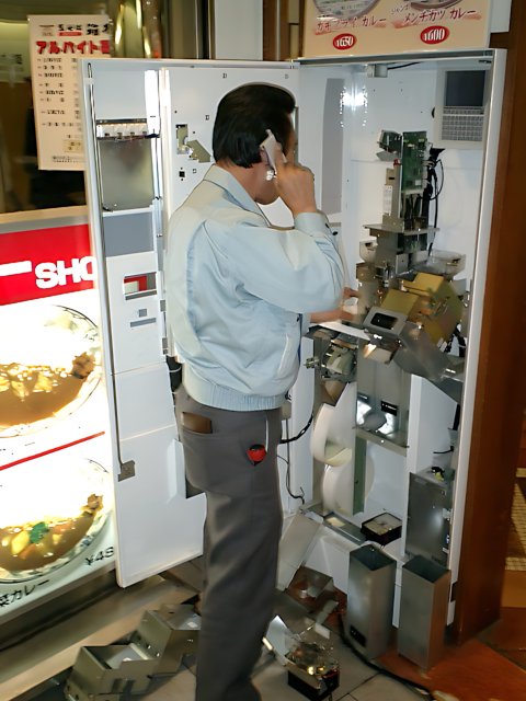 Man and Vending Machine in Tokyo
