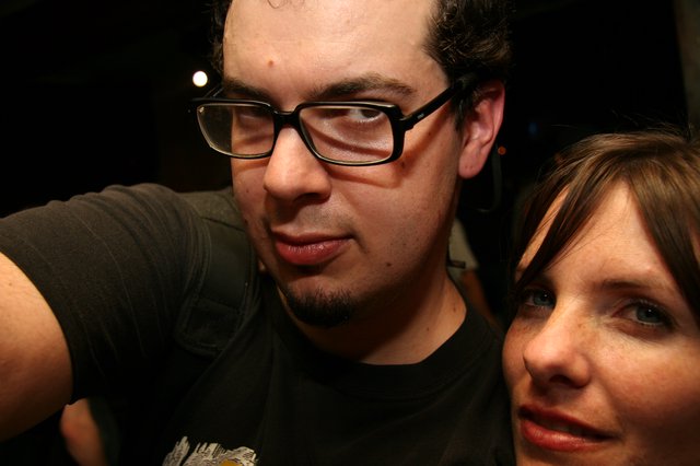 Two Friends Share a Close Moment at a Nightclub
