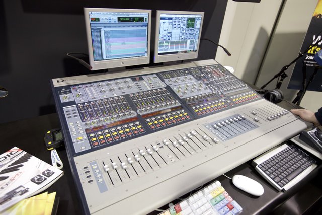 Studio Mixing Board with Dual Monitors and Keyboard