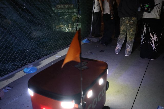 Autonomous Delivery Robot Navigates Nighttime Festival Crowd