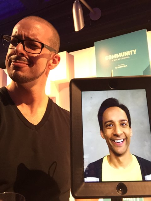 Danny Pudi Holds a Self-Portrait on His iPad
