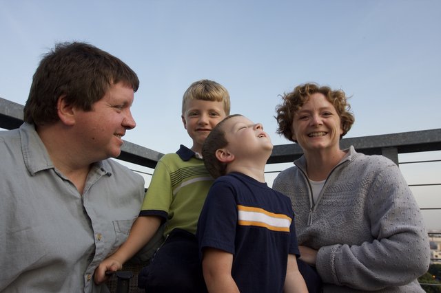 Family Moment on a City Rooftop at Dusk
