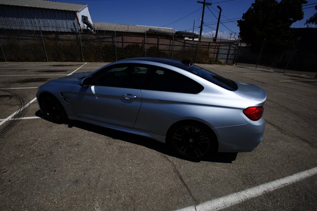 Parked BMW M4 with Alloy Wheels