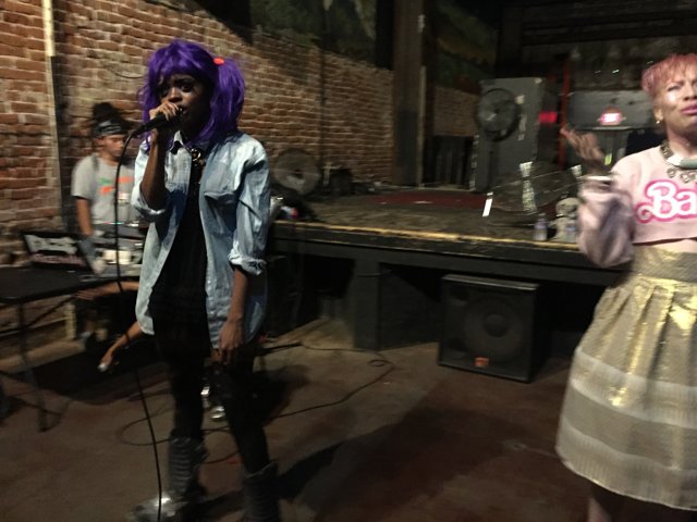 Purple-haired Duo Takes the Stage