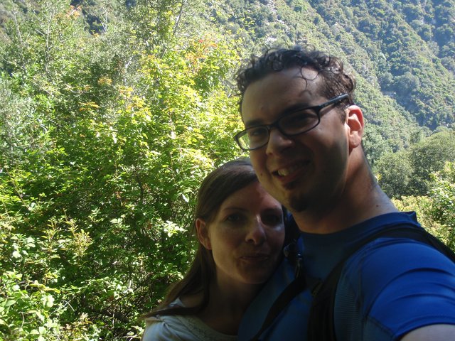 Couple Selfie Amid Lush Mountain Forest Trail