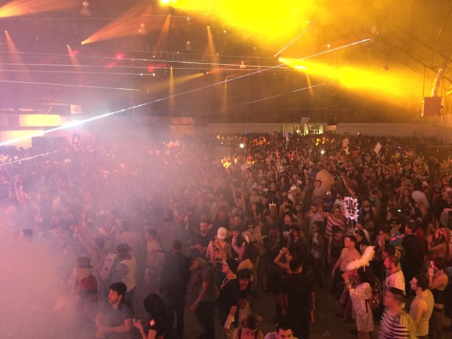 Smoke-Filled Concert Crowd