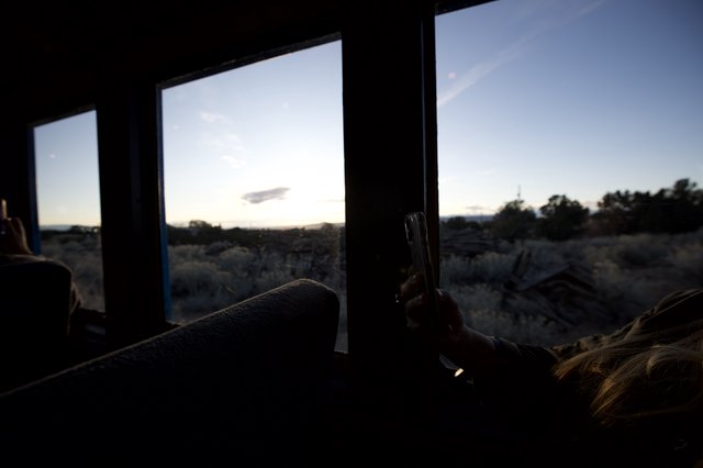 Desert Sunset View from Inside a Moving Bus