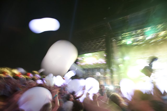 Balloons light up the night sky