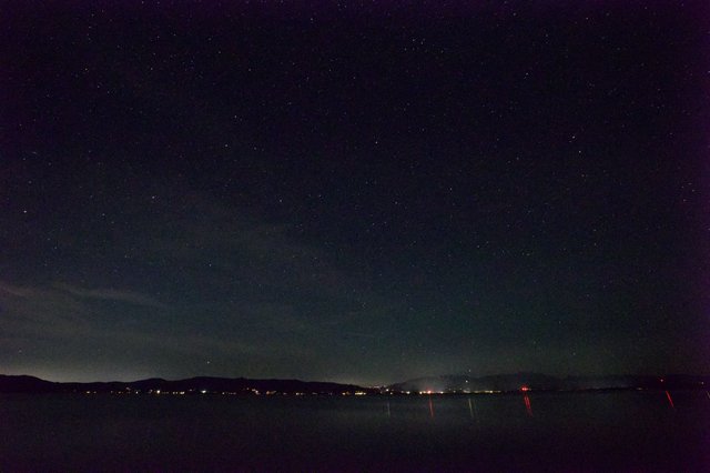 Starlit Night Sky Over Lake Tahoe Shores