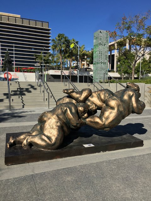 Statue of Two Women on a Bench at Civic Center Mall
