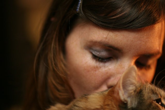 A Warm Embrace: Woman and Kitten, 2006