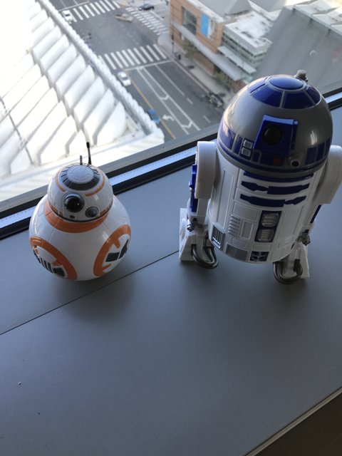 Toy Robots on a Window Sill