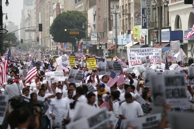 Protesters march through urban metropolis