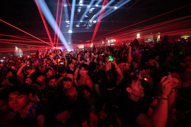 Red Laser Light Show Engulfs Massive Concert Crowd