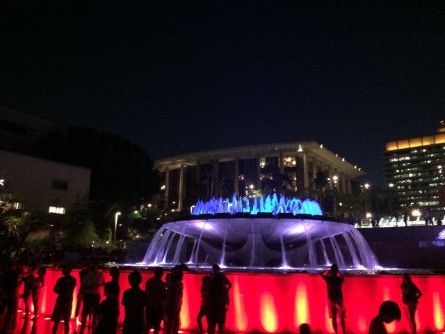 Nighttime Gathering at the Civic Center Mall Fountain