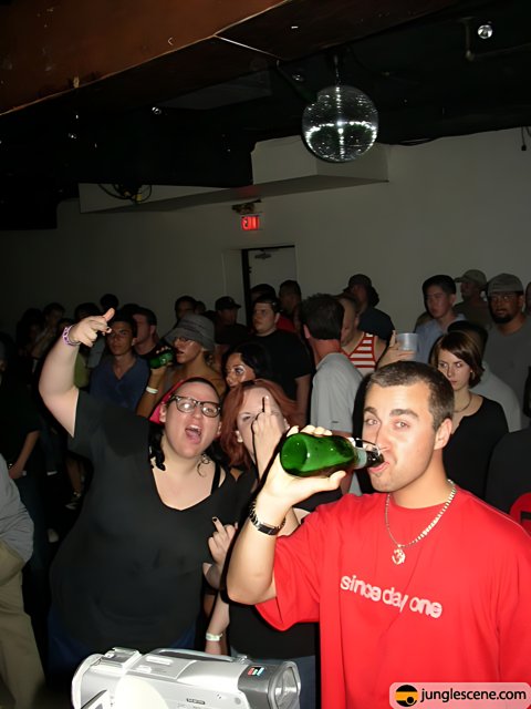 Partygoers with Beer at Nightclub