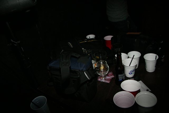 Cups and a Bag on a Table