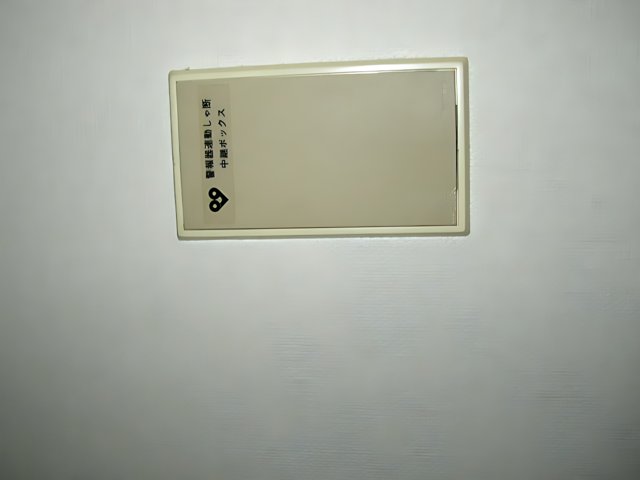 White Plastic Device with Label