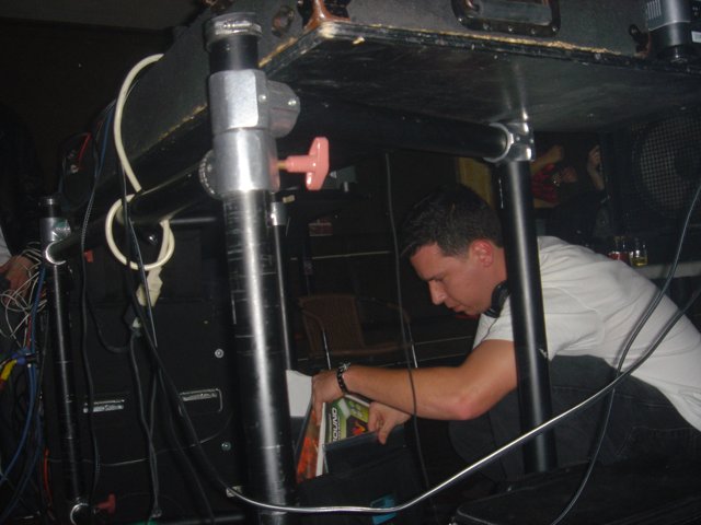 Rob G Performing with a Microphone and a Cord
