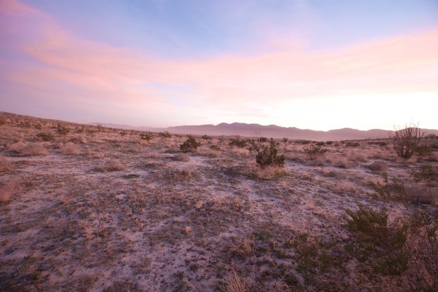Pink Sky Over Desert Mountains
