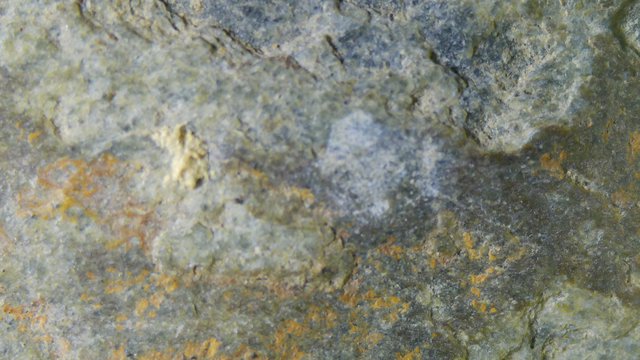 Macro Close-Up of Mineral-Rich Rock Surface