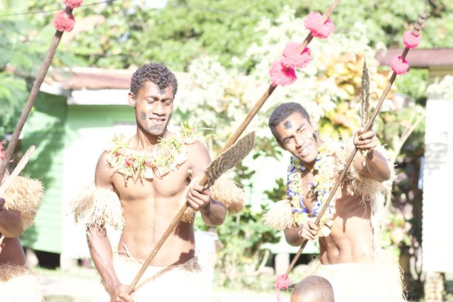 Traditional Fijian Men with Spears