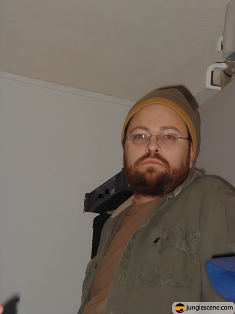 Bearded Man with a Handgun