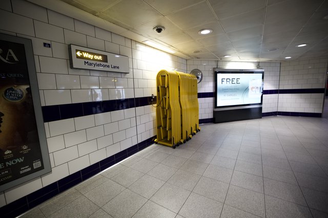 Yellow Safety Barriers at Marylebone Lane Underground Station Exit