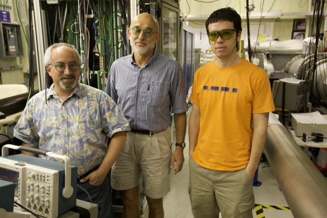 Three Men Working on a Computer at Caltech LIGO