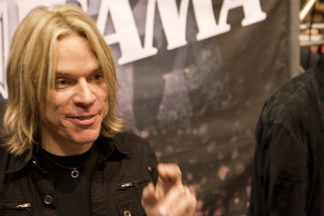 Andy Timmons Rocks the Black Shirt and Blonde Locks