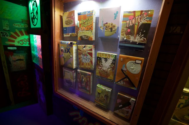 Vintage Cereal Box Display in Nostalgic Museum Setting