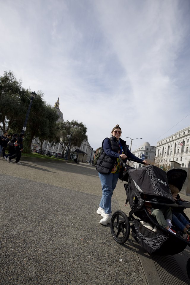 Parent with Stroller Exploring San Francisco Civic Center