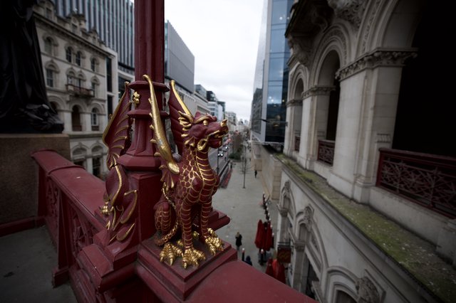 Guardian Dragon Overlooking Historic London Street