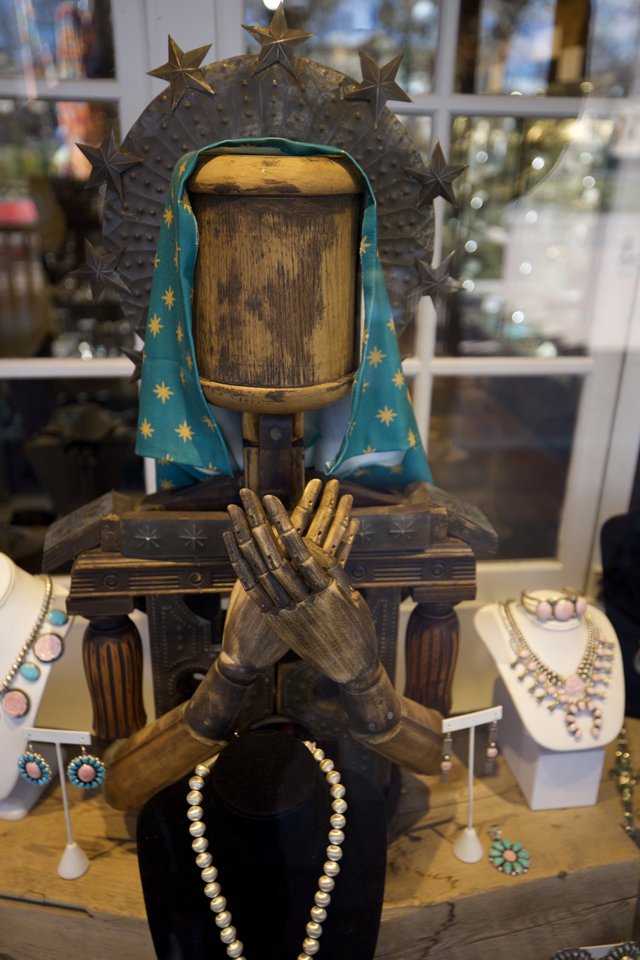 Religious Folk Art Sculpture Display with Southwestern Jewelry