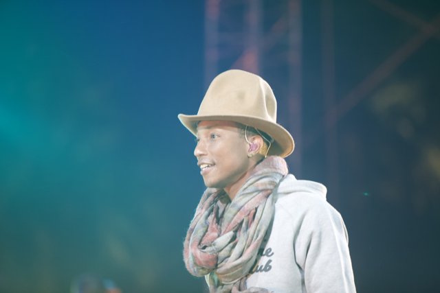 Pharrell Williams Rocks a Cowboy Hat and Scarf on Stage at Coachella